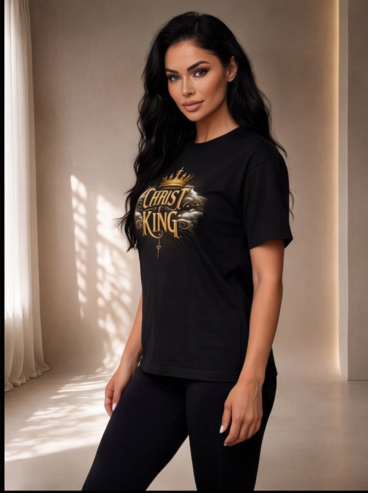 Woman wearing a black t-shirt with 'Chase King' design in a softly lit room.