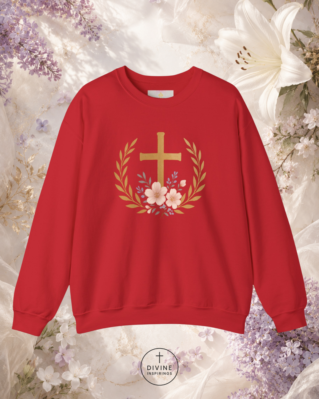 Red sweatshirt with a gold cross and floral wreath design on a floral background