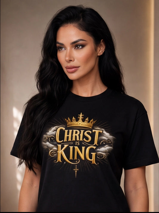 Woman wearing a black t-shirt with 'Christ is King' design on a neutral background