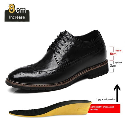 Black dress shoe with height-increasing insole on a white background