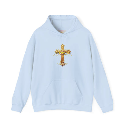 Becoming Women’s Faith Hoodie – Gold Cross Edition (1 Corinthians 15:49)