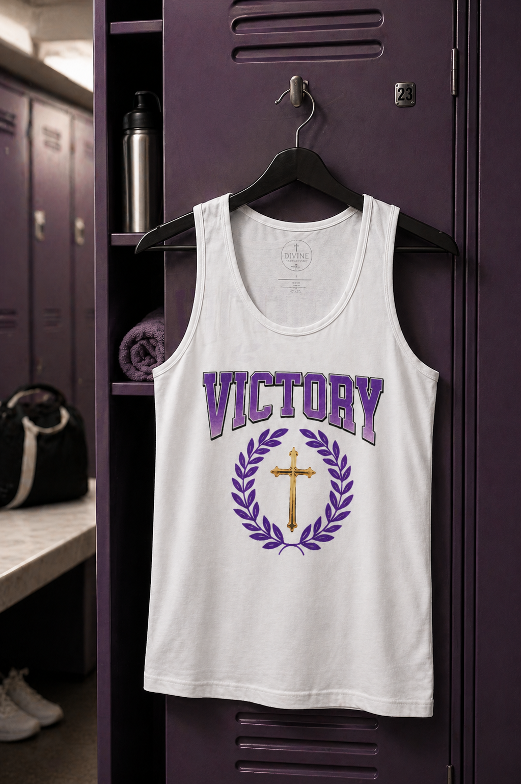 White tank top with 'VICTORY' and cross design hanging on a locker.