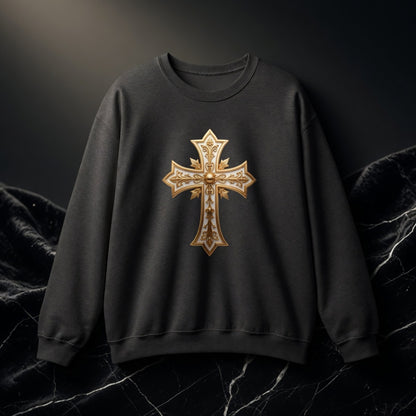 Black sweatshirt with a gold cross design on a dark background