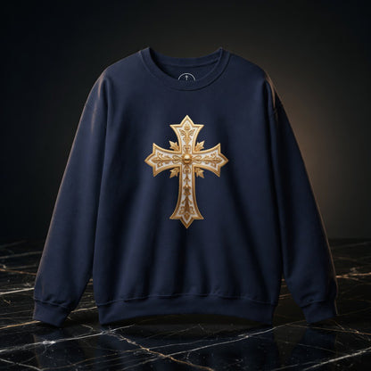Navy blue sweatshirt with a gold cross design on a dark background
