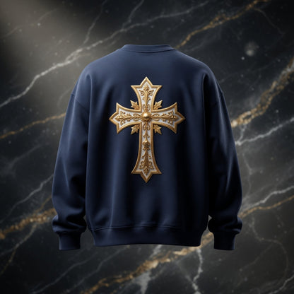 Navy blue sweatshirt with a gold cross design on a marble background