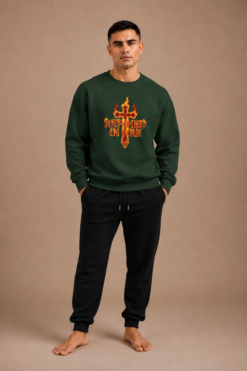 Man wearing a green sweatshirt with a logo on a beige background