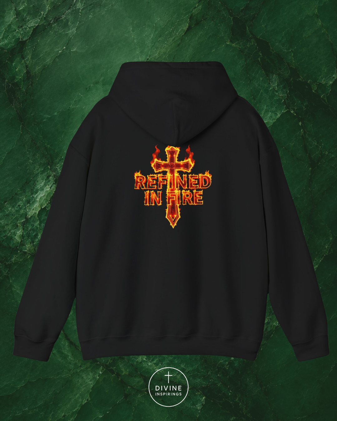 Black hoodie with 'Refined in Fire' design on a green textured background
