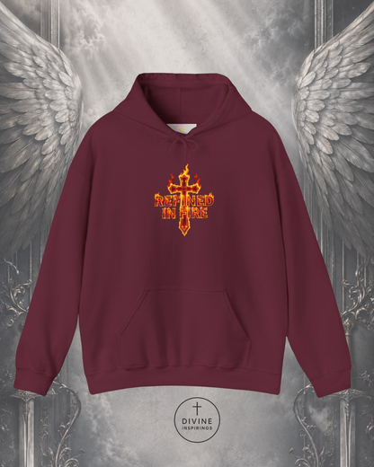 Maroon hoodie with a red and yellow cross design on a metallic background with angel wings.