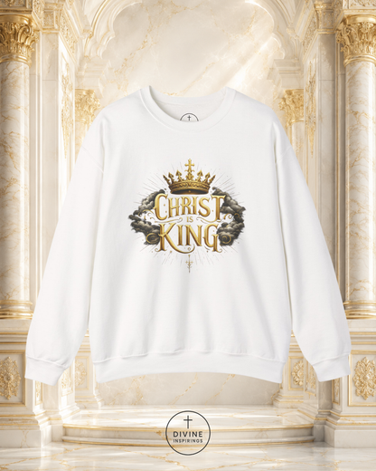 White sweatshirt with 'Christ is King' design on a decorative background