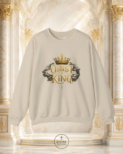 Beige sweatshirt with 'Christ the King' design in gold on a decorative background