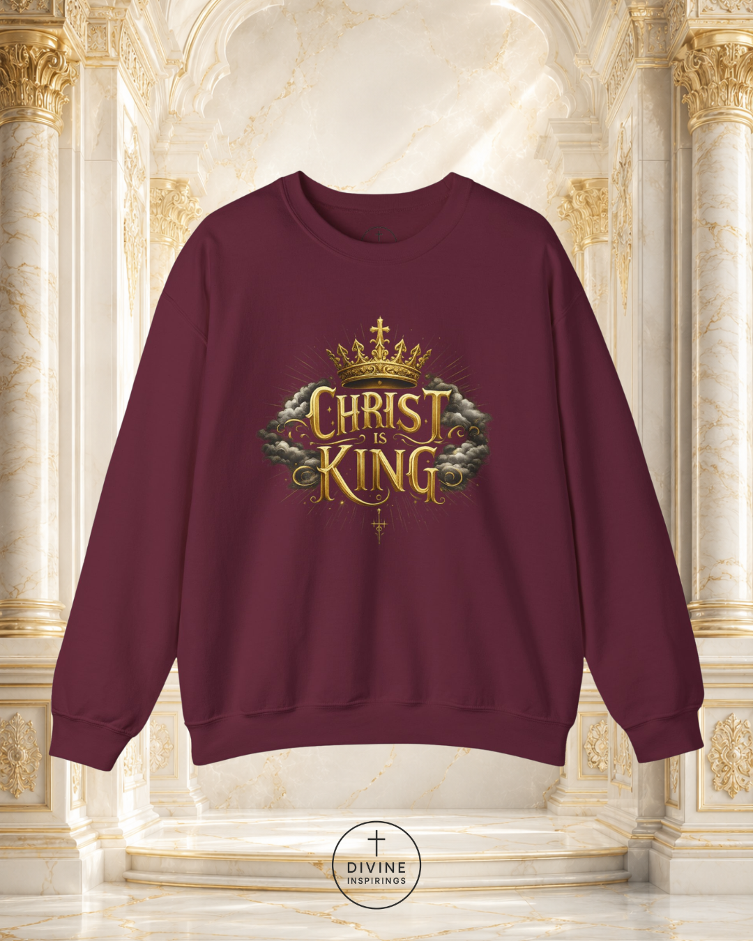 Maroon sweatshirt with 'Christ King' design in gold and green on a decorative background