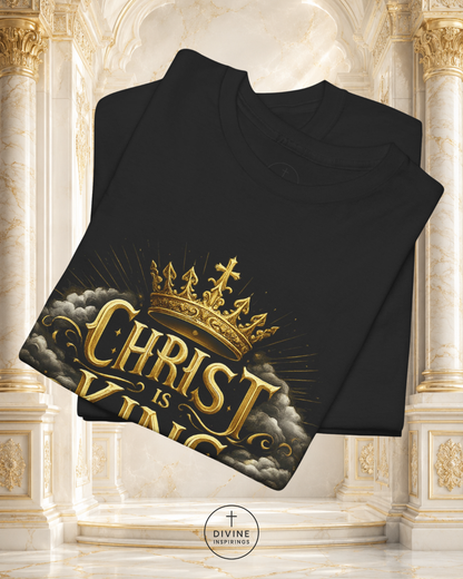 Black sweatshirt with gold 'Christ is King' design on a decorative background