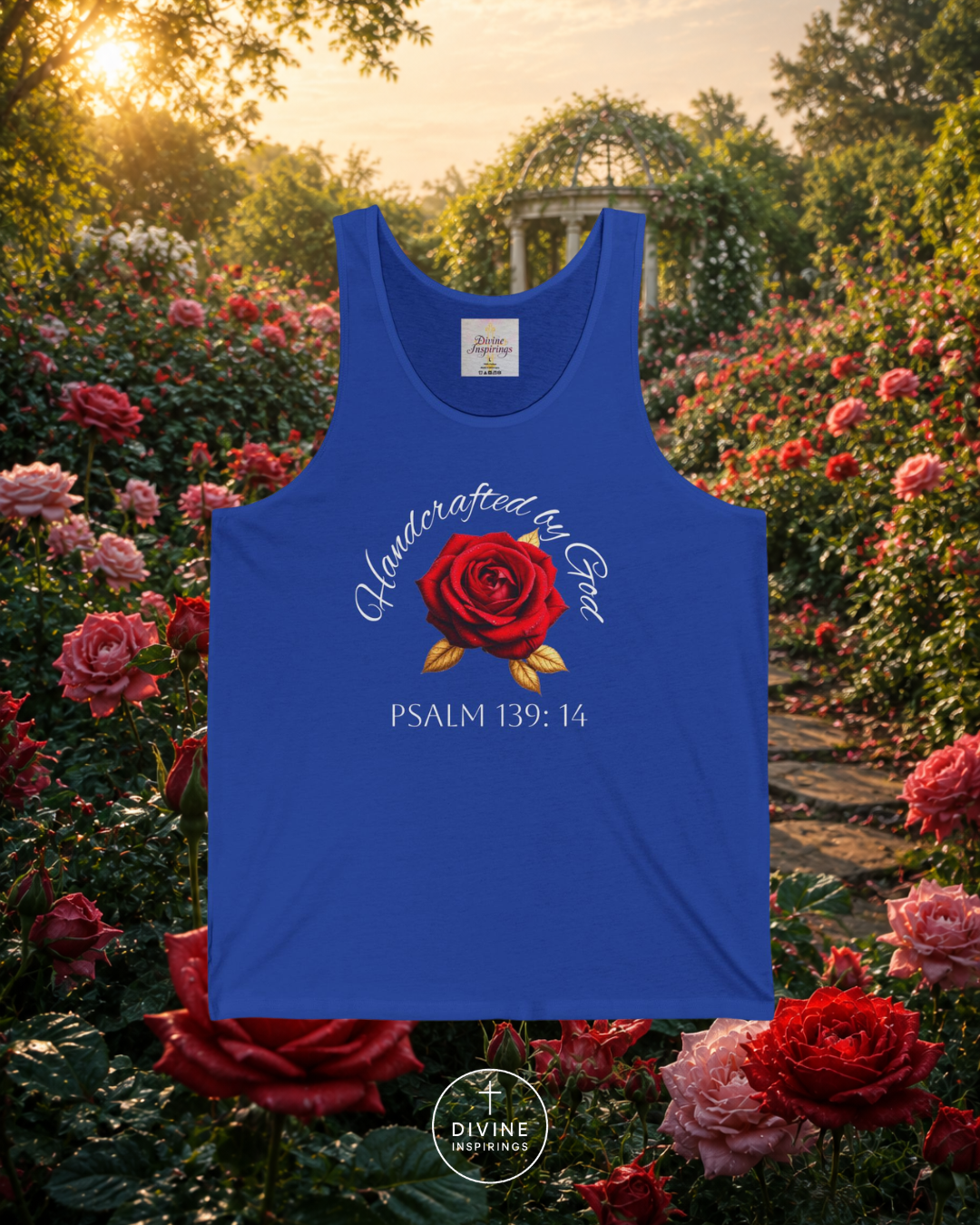 Blue tank top with a red rose design and text in a garden setting