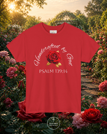 Red t-shirt with floral design and text in a garden setting