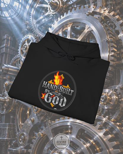 Black hoodie with 'Hand Built by God' logo on a mechanical gear background
