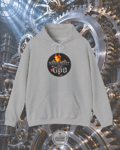 Gray hoodie with 'Hand Built by God' logo on a mechanical gear background
