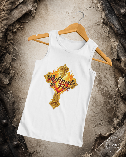 White tank top with 'Refined in Fire' design on a hanger against a textured wall background.