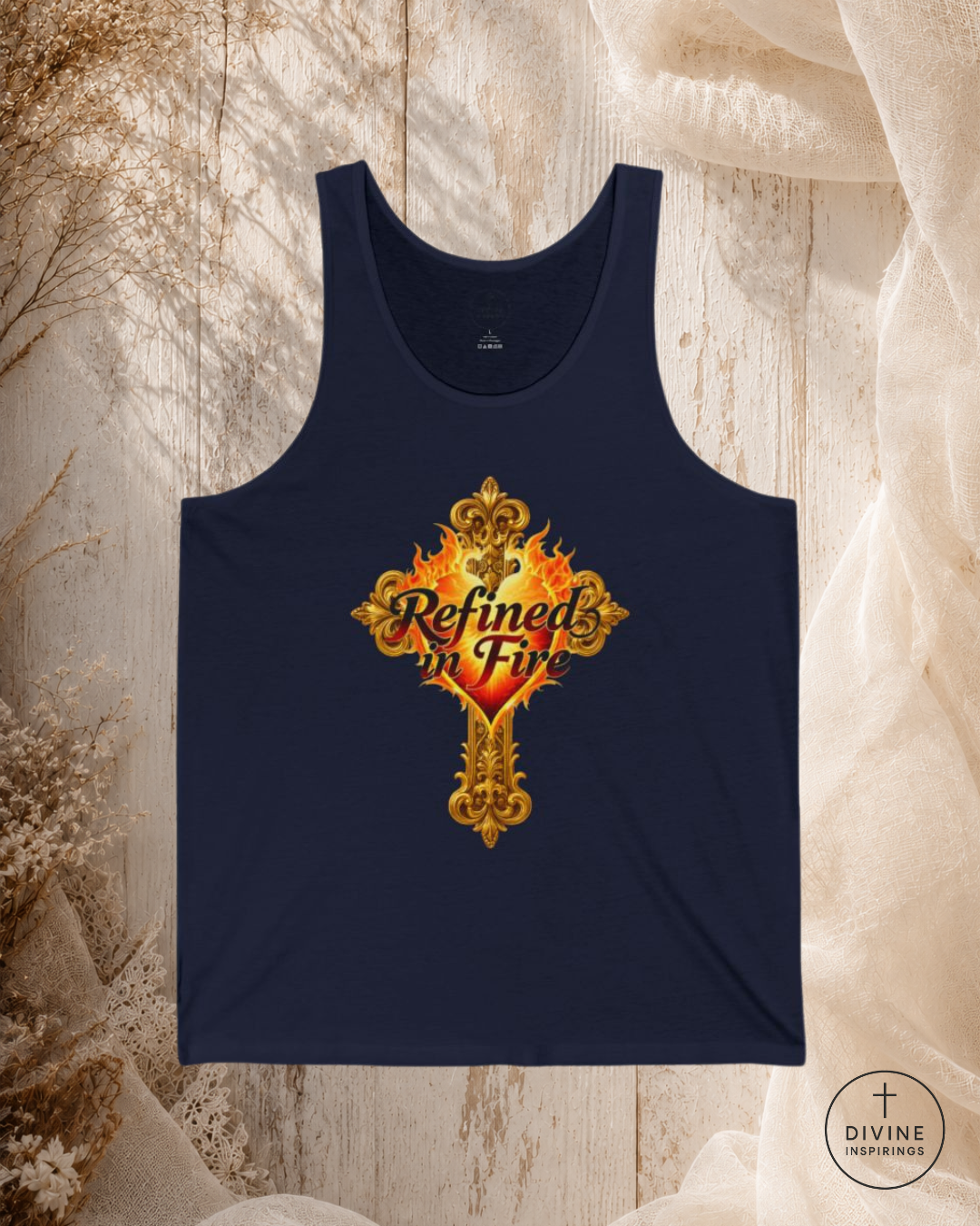 Black tank top with 'Refined in Fire' design on a textured beige background
