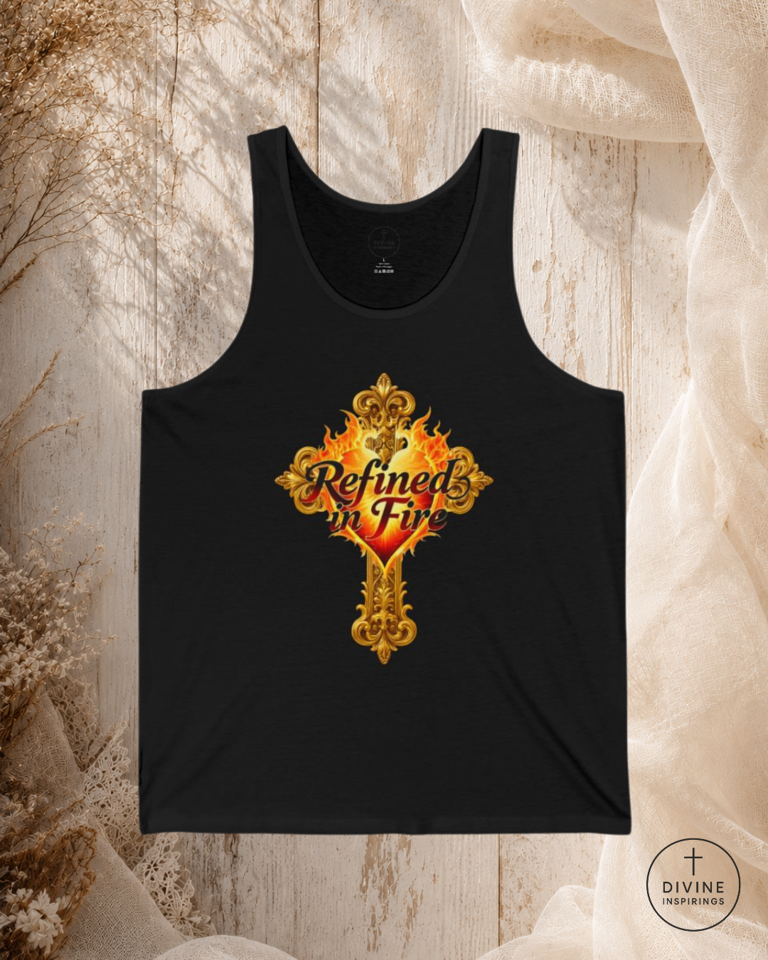 Black tank top with 'Refined in Fire' design on a textured surface