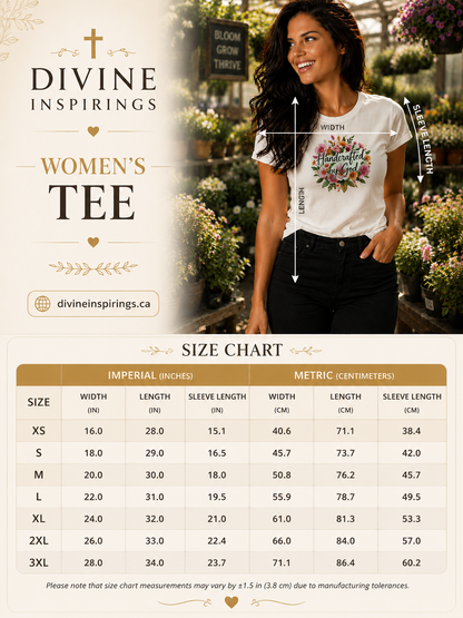 Woman wearing a white t-shirt with a floral design in a garden setting, featuring 'Divine Inspirings' branding.