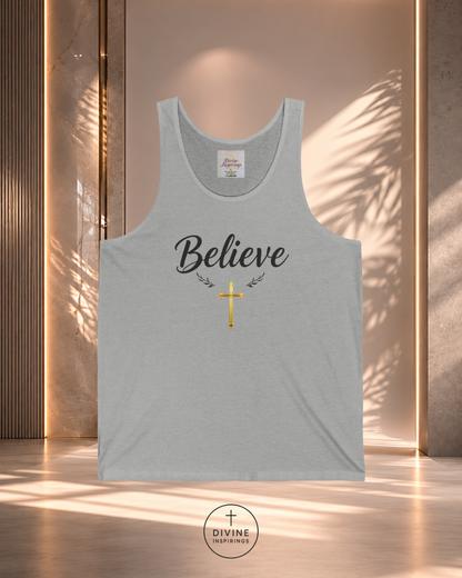Gray tank top with 'Believe' and cross design on a wooden background