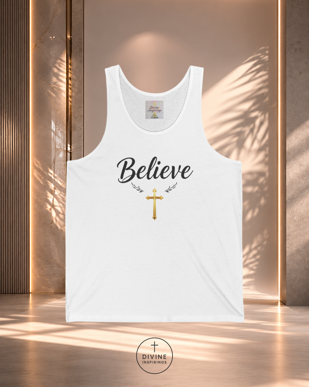 White tank top with 'Believe' and a cross design on a wooden background