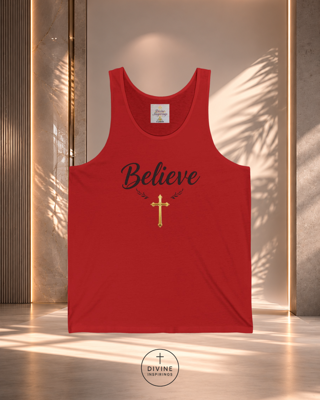 Red tank top with 'Believe' and a cross design on a neutral background