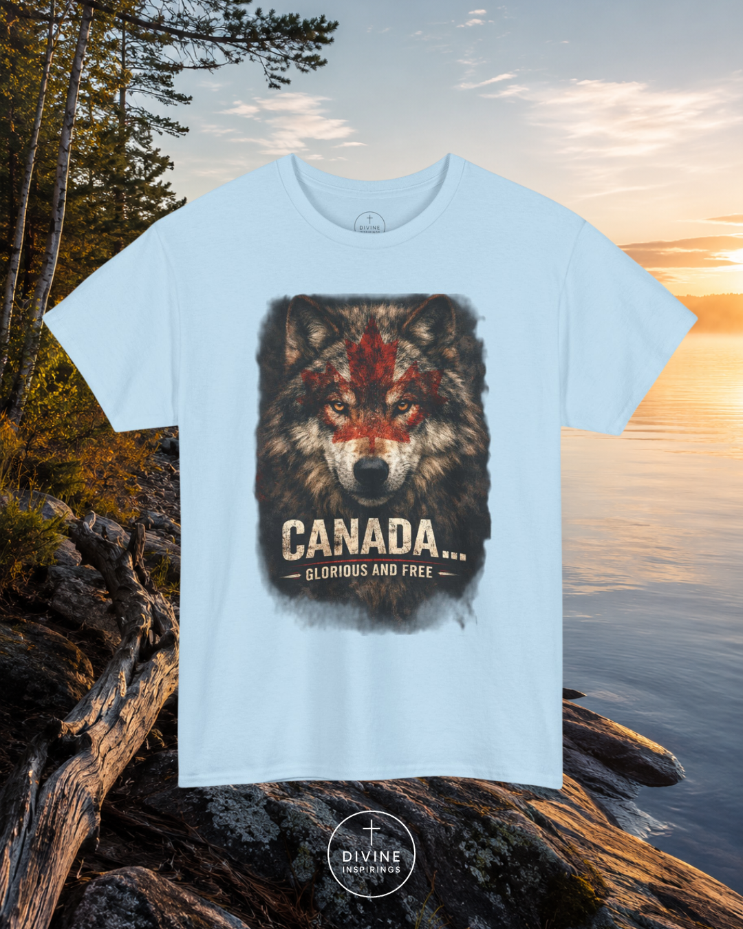 Light blue t-shirt with a wolf graphic and 'Canada Glorious and Free' text, set against a natural background.