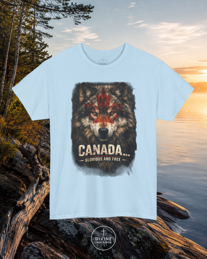 Light blue t-shirt with a wolf graphic and 'Canada Glorious and Free' text, set against a natural background.