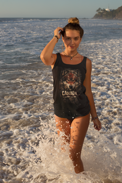 Woman walking on a beach with ocean waves