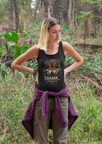 Woman wearing a tank top with a wolf design and 'Canada' text, standing in a forest.