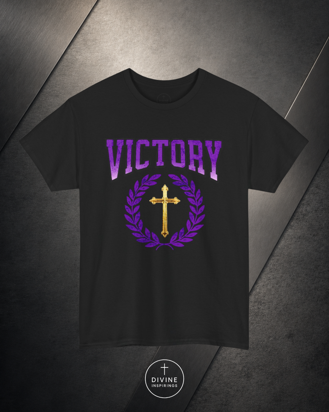 Navy blue t-shirt with 'VICTORY' and cross design on a dark background