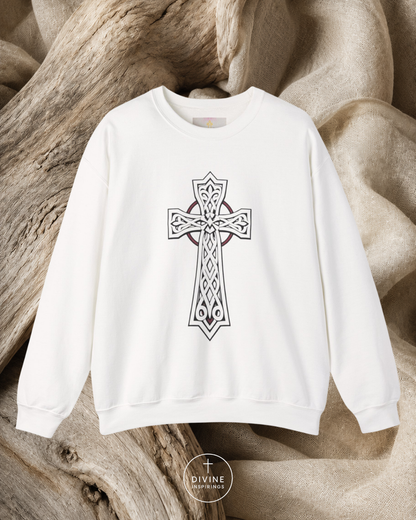 White sweatshirt with a Celtic cross design on a textured beige background