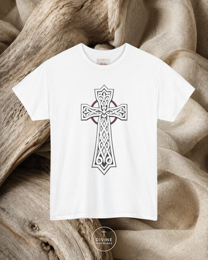 White t-shirt with a Celtic cross design on a wooden surface