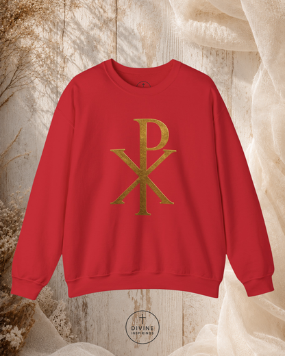 Red sweatshirt with gold logo on a textured beige background