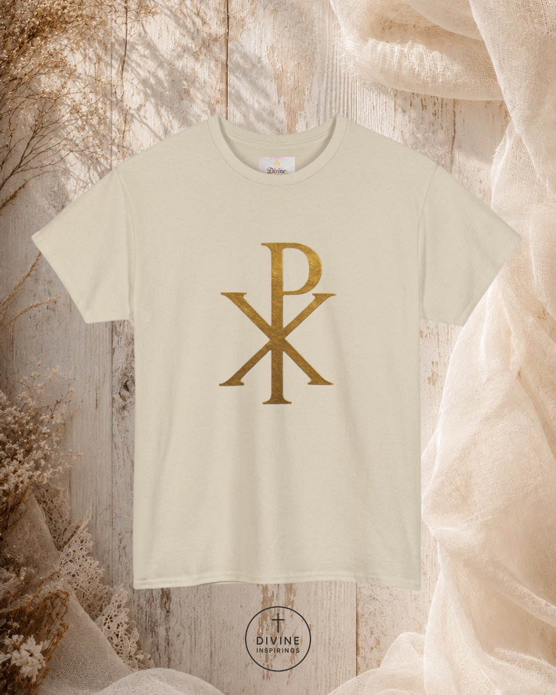 Beige t-shirt with gold symbol on a textured surface