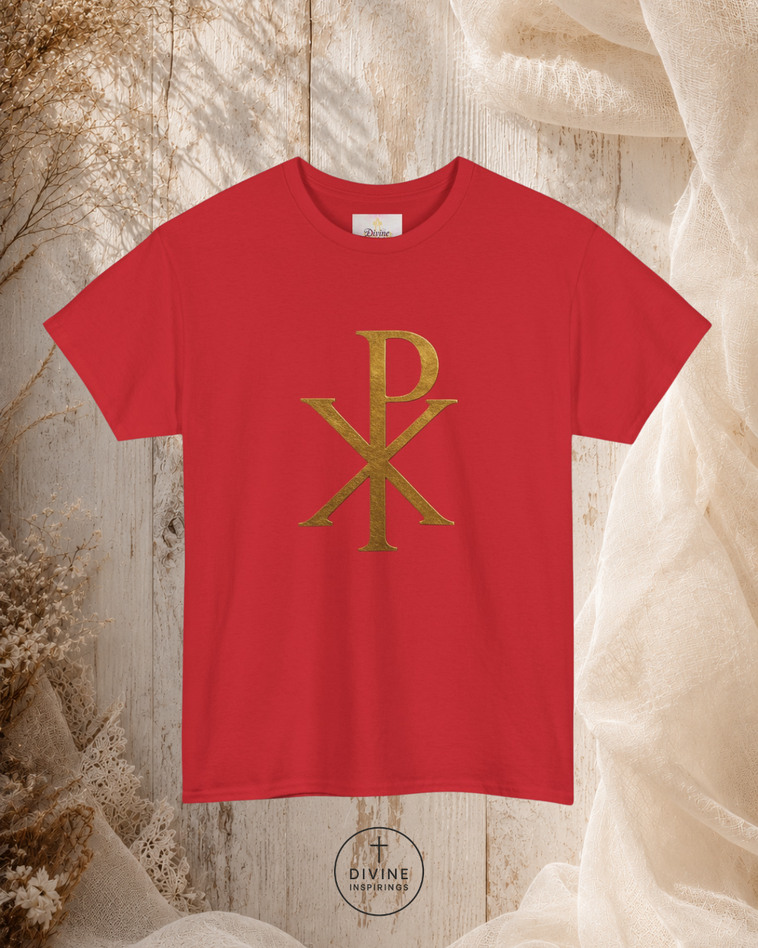 Red t-shirt with gold logo on a textured beige background