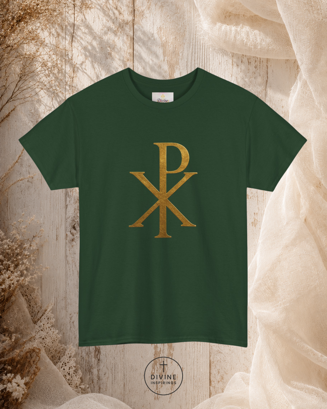 Green t-shirt with gold symbol on a textured beige background