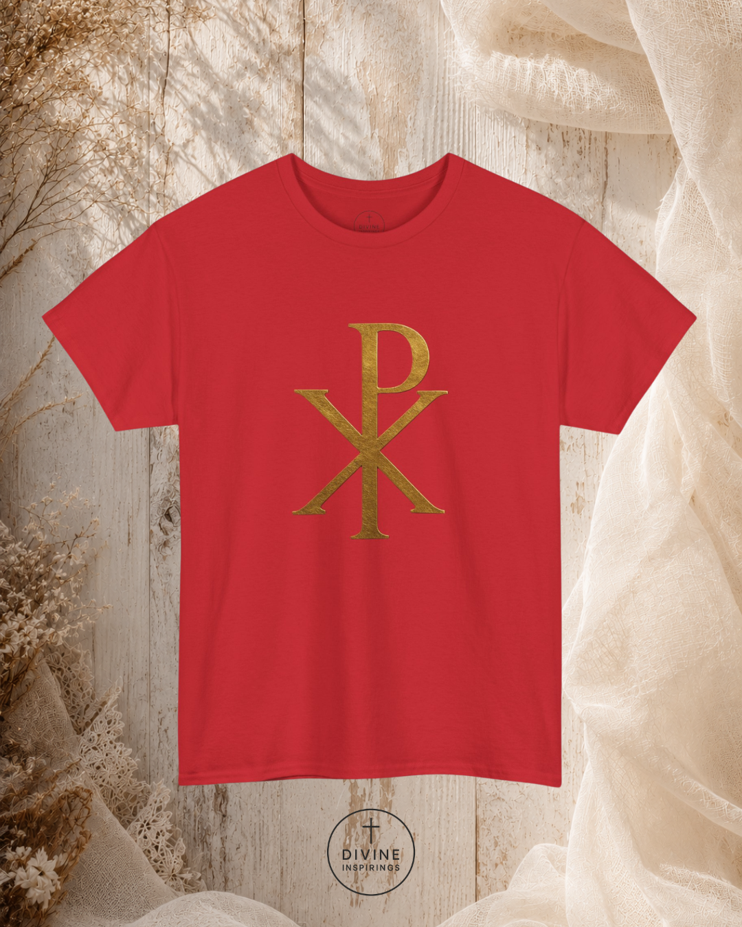 Red t-shirt with gold logo on a textured beige background