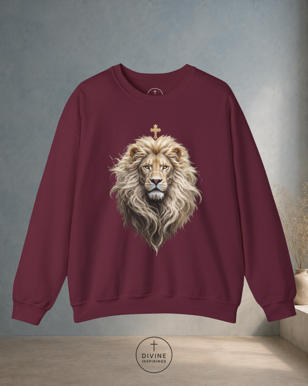 Maroon sweatshirt with a lion graphic on a gray background