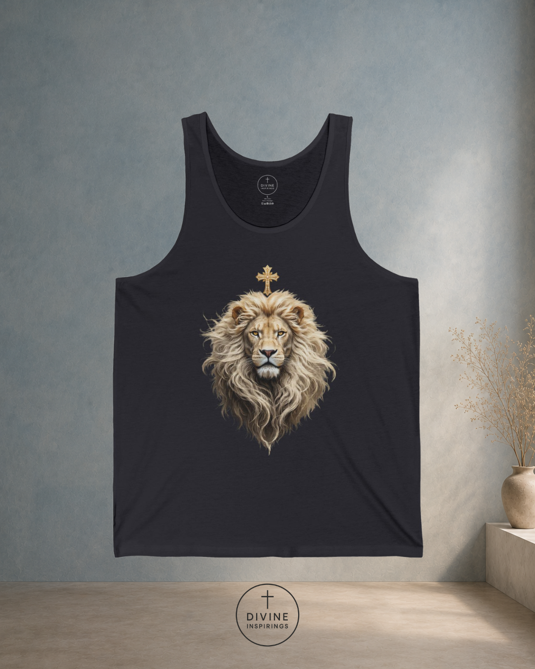Black tank top with a lion design and cross on a gray wall background