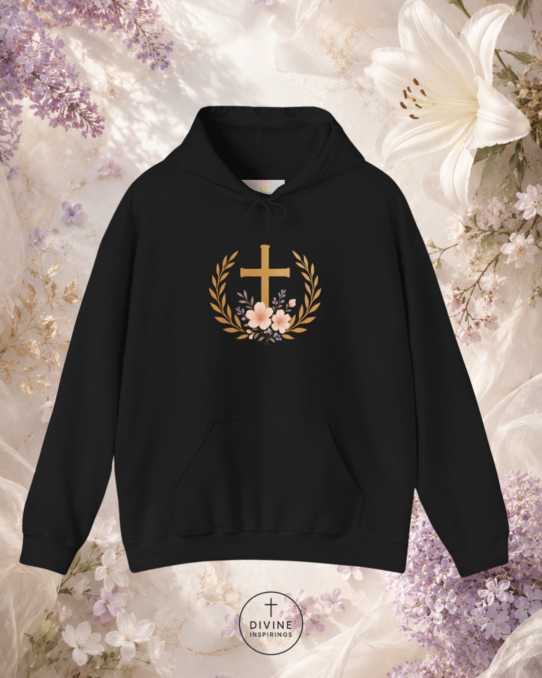 Black hoodie with a gold cross and floral wreath design on a floral background