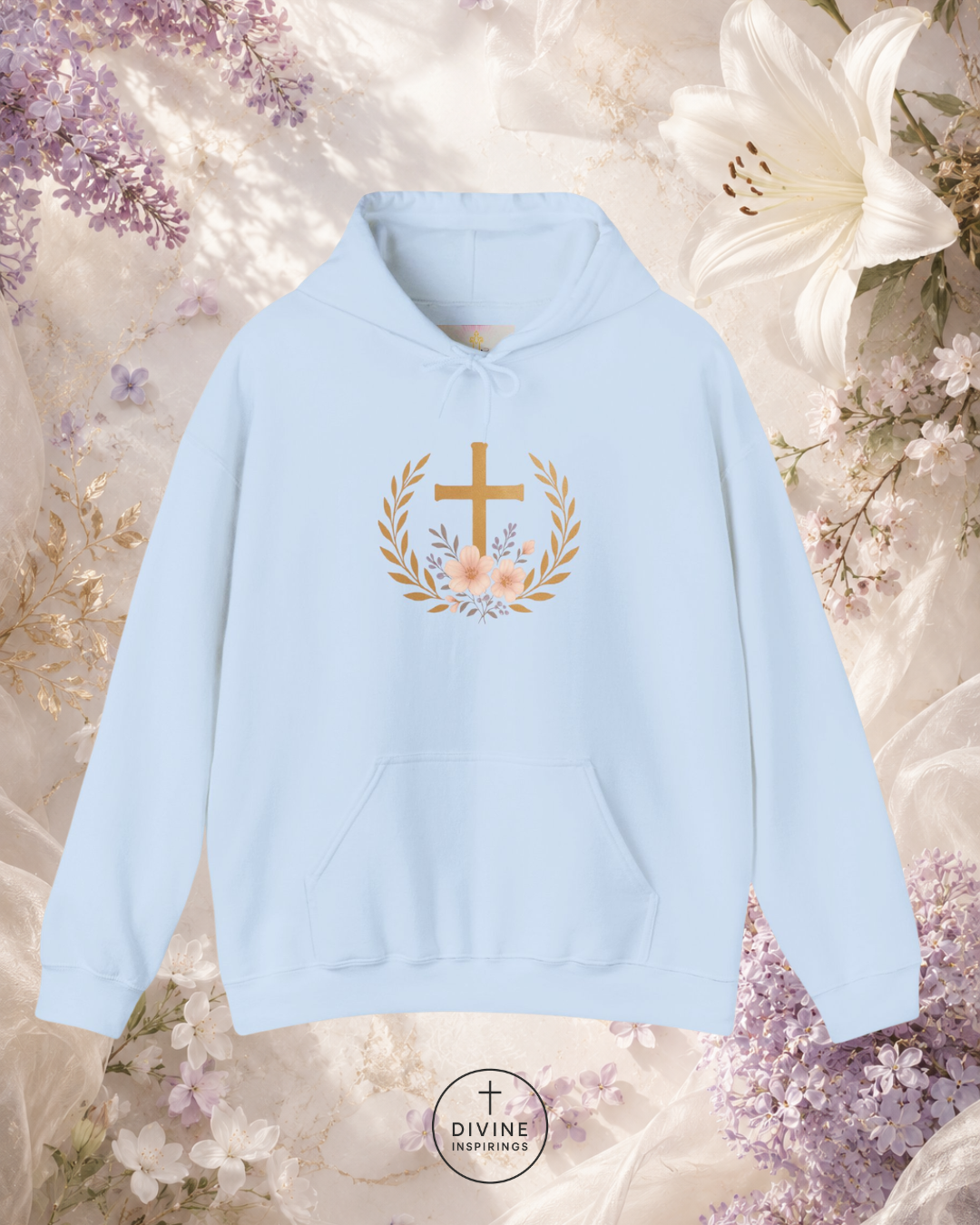 Light blue hoodie with a floral cross design on a floral background