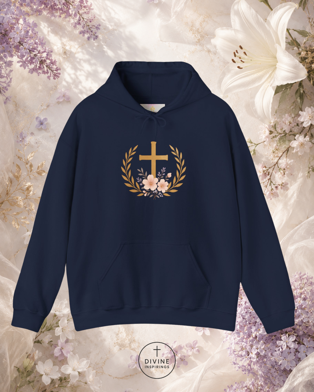 Navy blue hoodie with a gold cross and floral wreath design on a floral background.