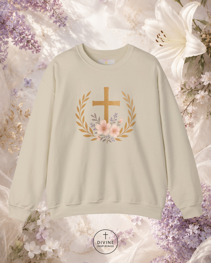 Light green sweatshirt with a cross and floral design on a floral background