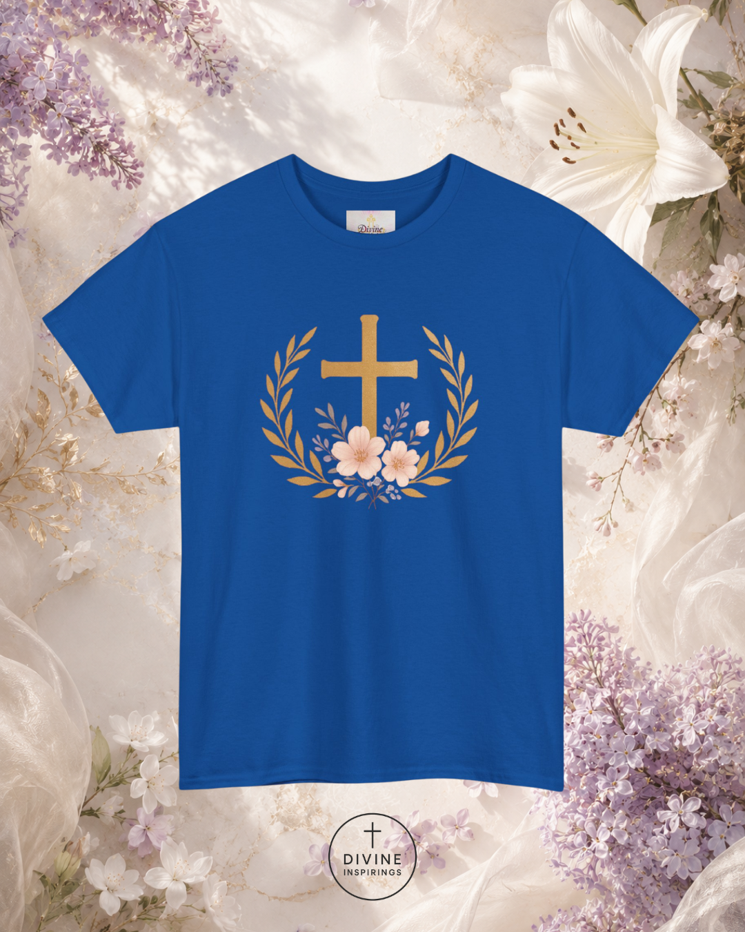 Blue t-shirt with a gold cross and flowers design on a floral background