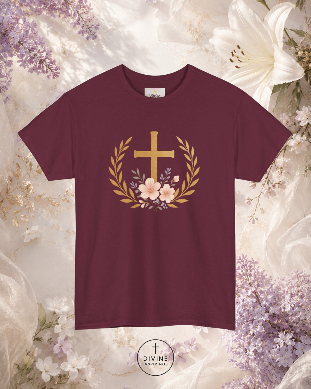 Maroon t-shirt with a gold cross and flowers design on a floral background