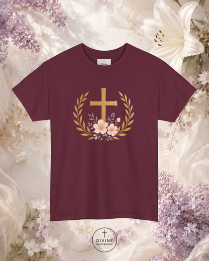 Maroon t-shirt with a gold cross and flowers design on a floral background