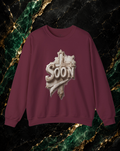 Maroon sweatshirt with 'SOON' graphic on a marble background