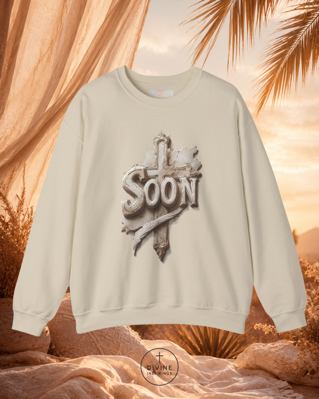 Beige sweatshirt with 'Soon' design against a warm, natural background